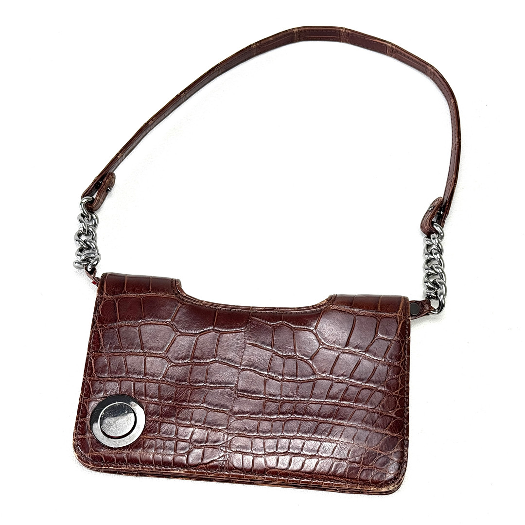 VINTAGE CHRISTIAN LOUBOUTIN SHOULDER BAG.