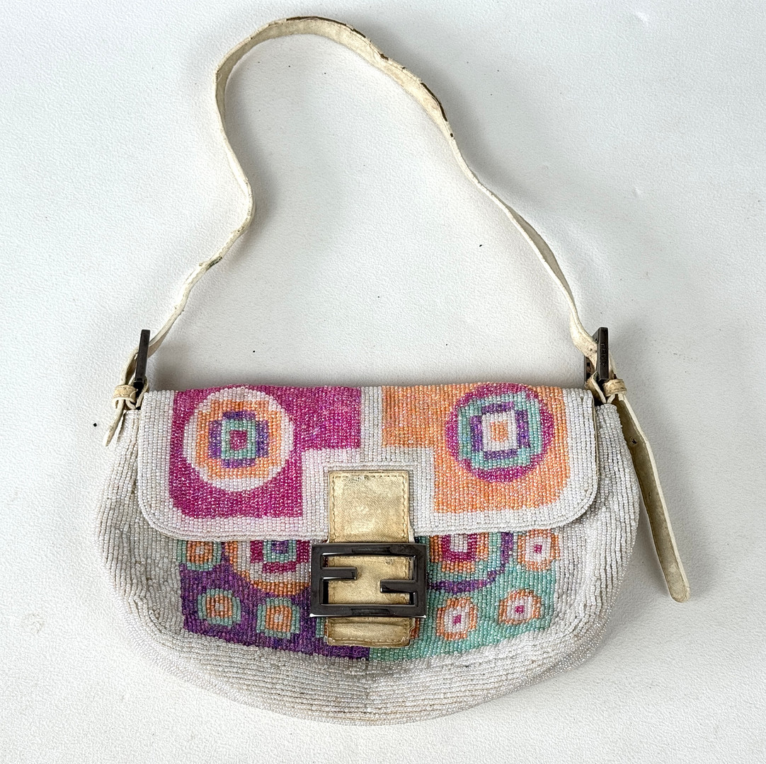 FENDI BAGUETTE BEADED HAND BAG.