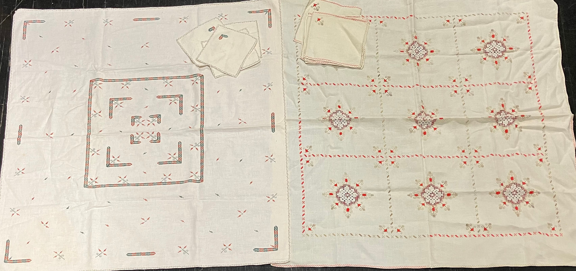 Two embroidered linen tablecloths, 20th Century.