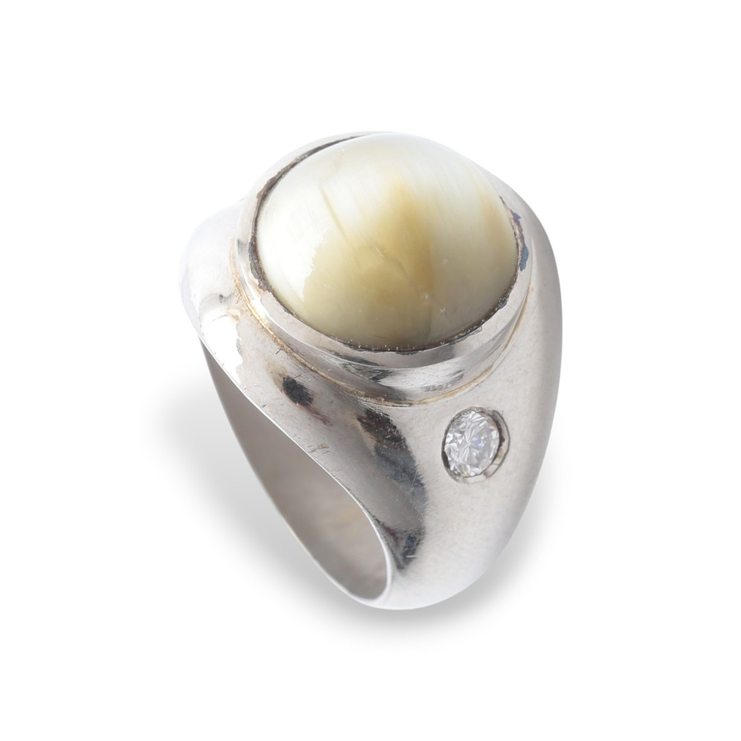 Chrysoberyl and diamonds ring.