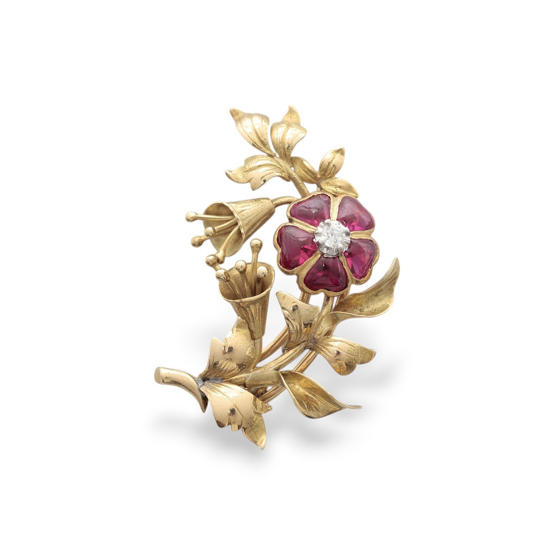 Floral brooch in gold and gemstones, mid 20th Century.