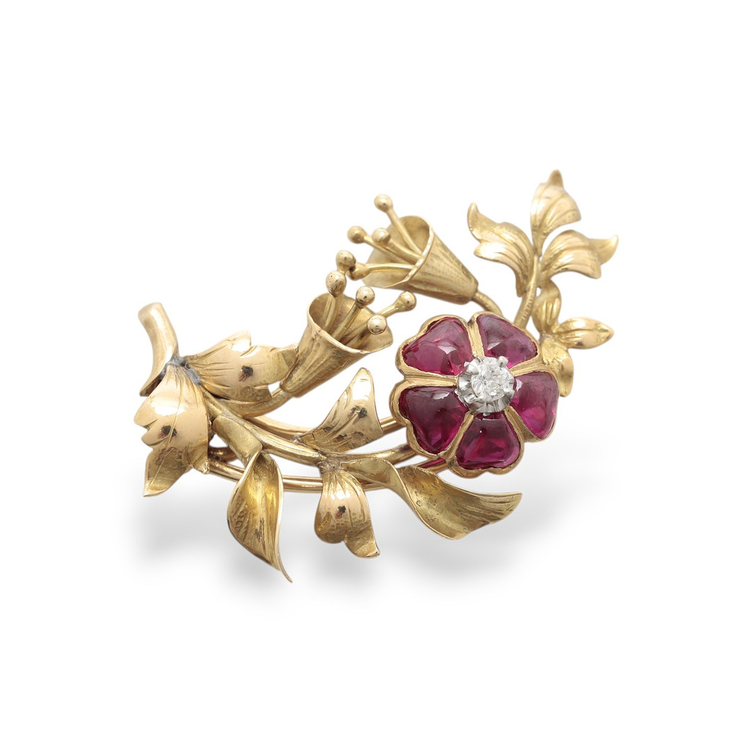 Floral brooch in gold and gemstones, mid 20th Century.