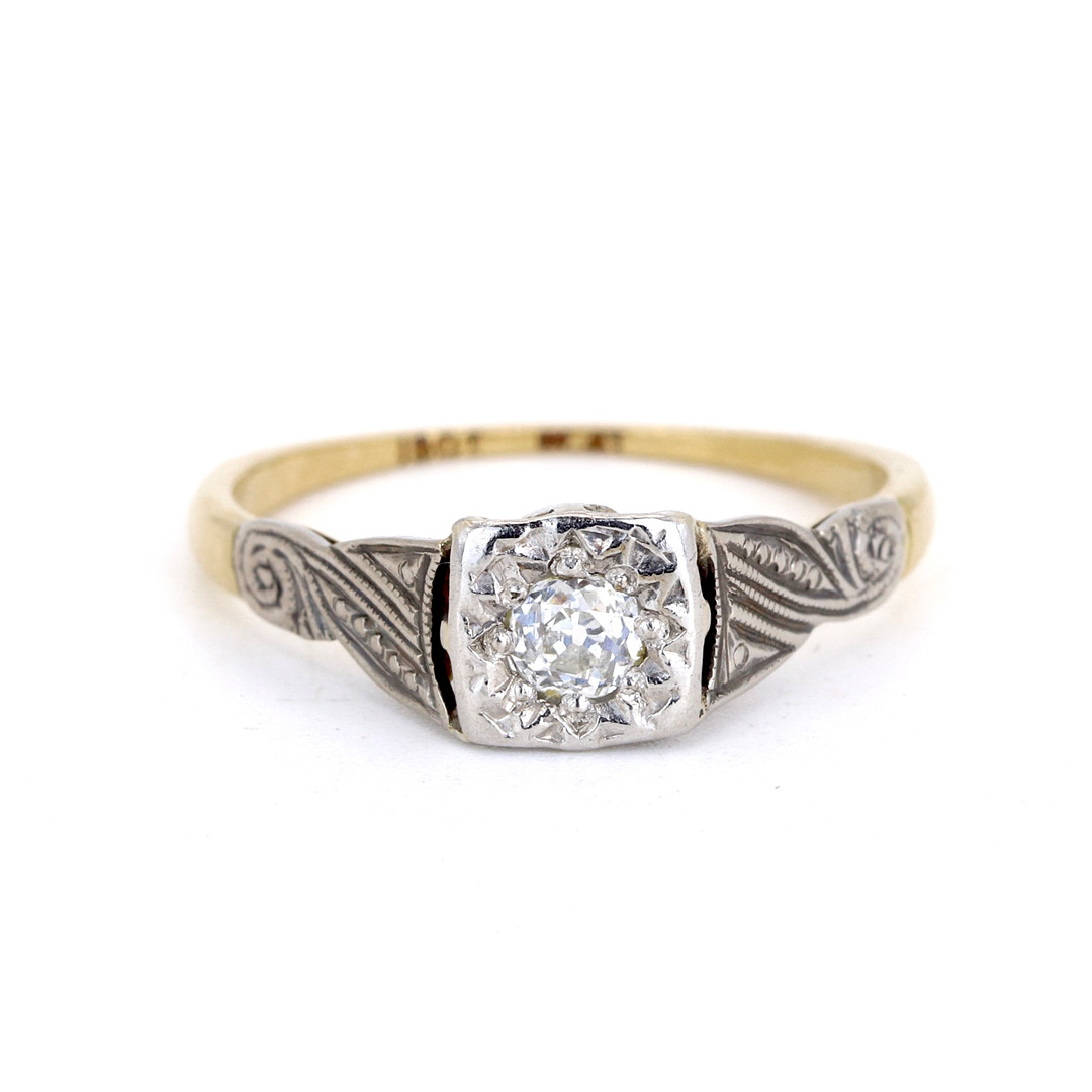 18CT GOLD DIAMOND RING.