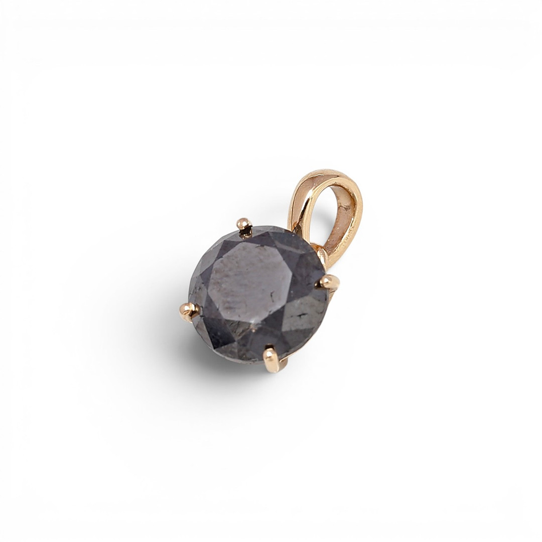 Black diamond solitaire pendant.