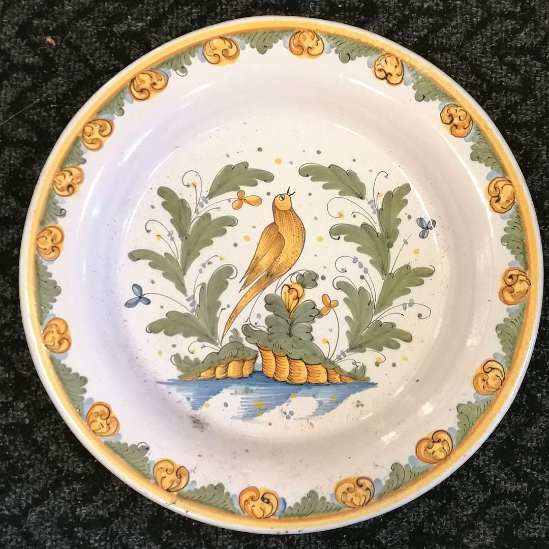 LARGE CONTINENTAL WALL CHARGER WITH SONG BIRD DETAIL.