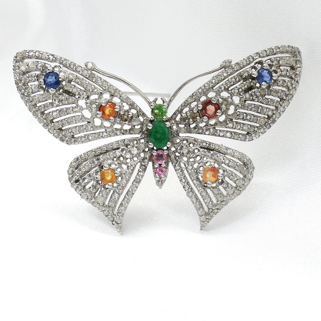 BUTTERFLY BROOCH with emerald, sapphires & diamonds.