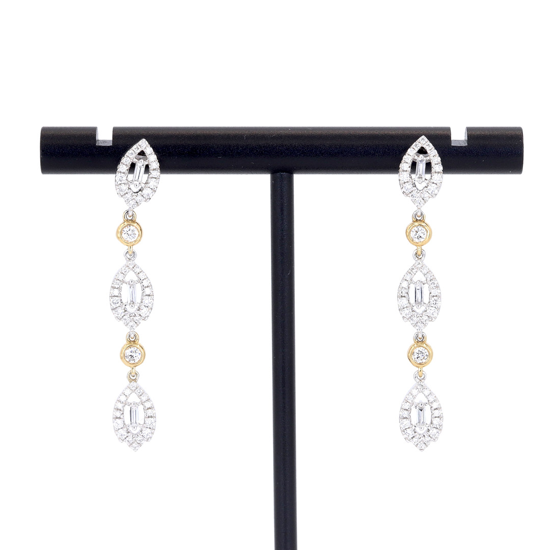 18CT GOLD DIAMOND EARRINGS.