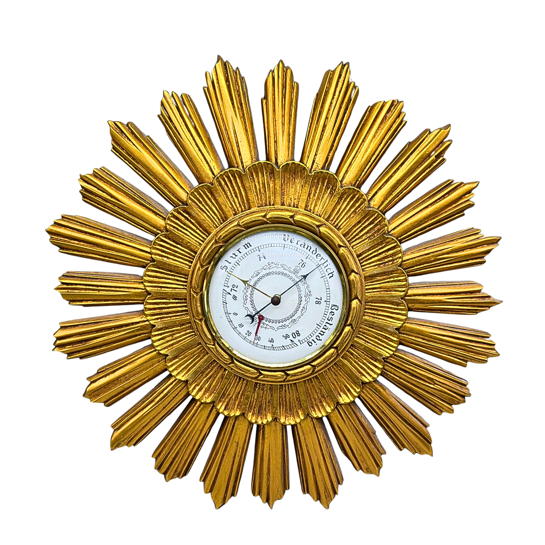 DEUTSCHER BAROMETER IM DESIGN EINER SONNE AUS DEN 1960ER/70ER-JAHREN.