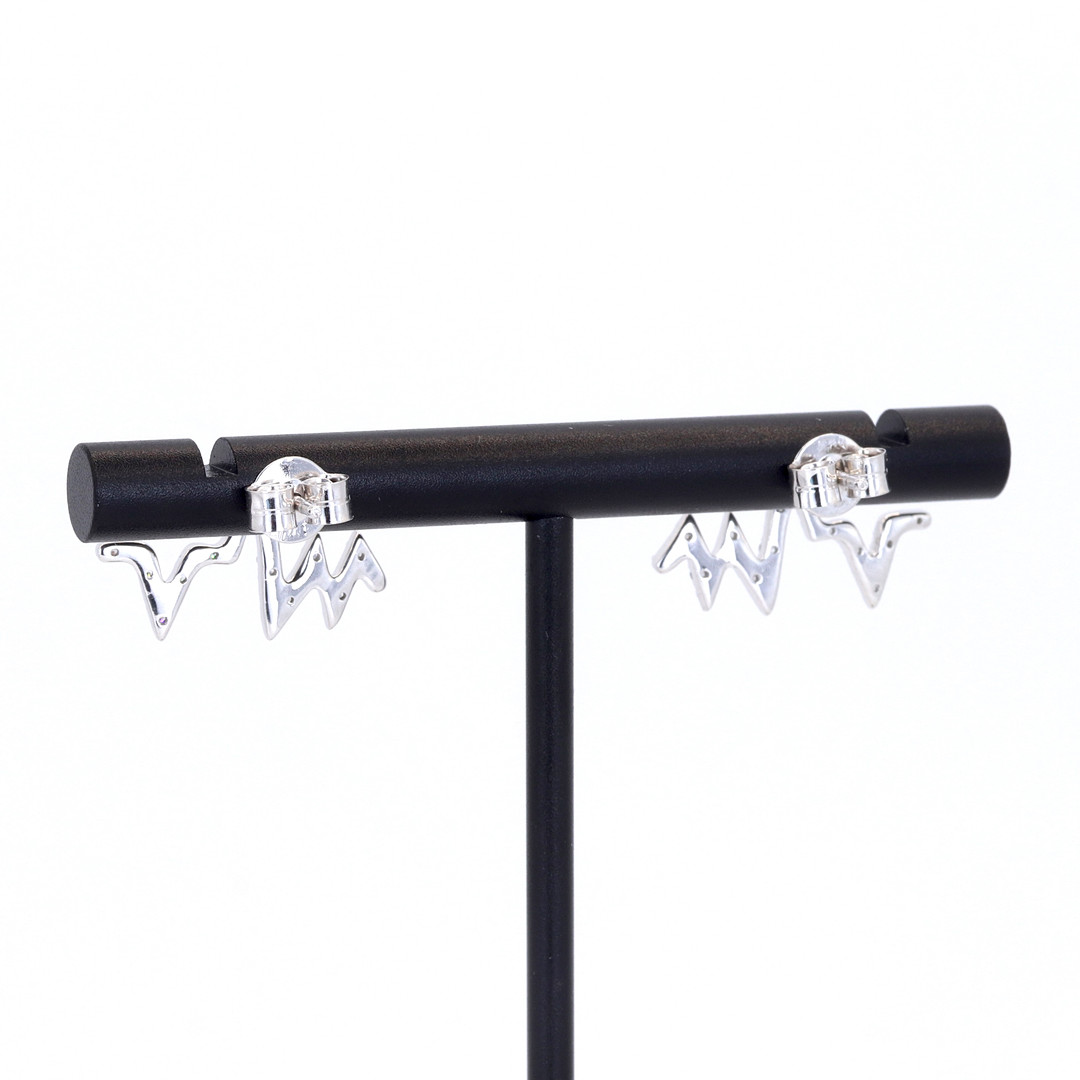 14CT GOLD DIAMOND EARRINGS.