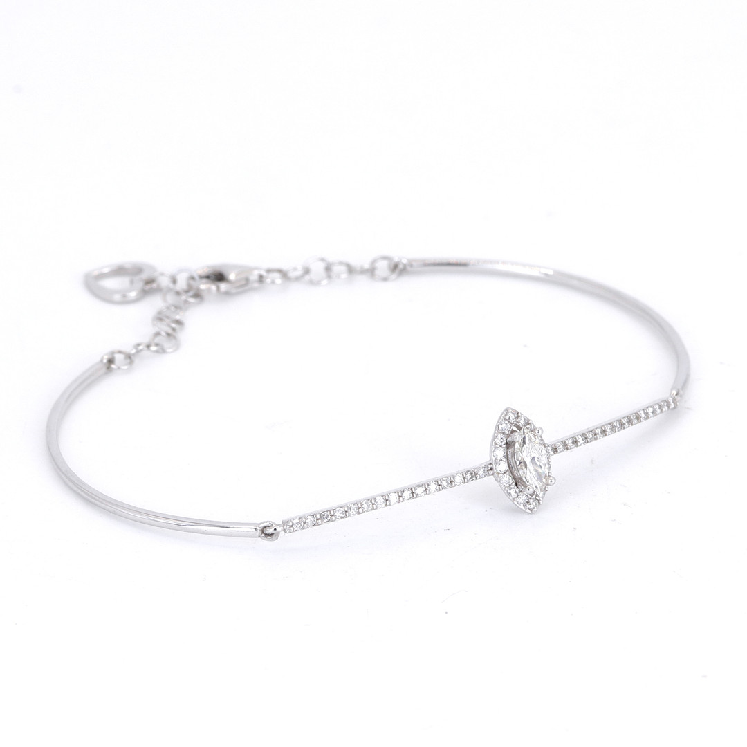 14CT GOLD DIAMOND BRACELET.