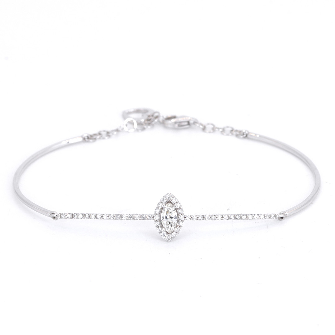 14CT GOLD DIAMOND BRACELET.