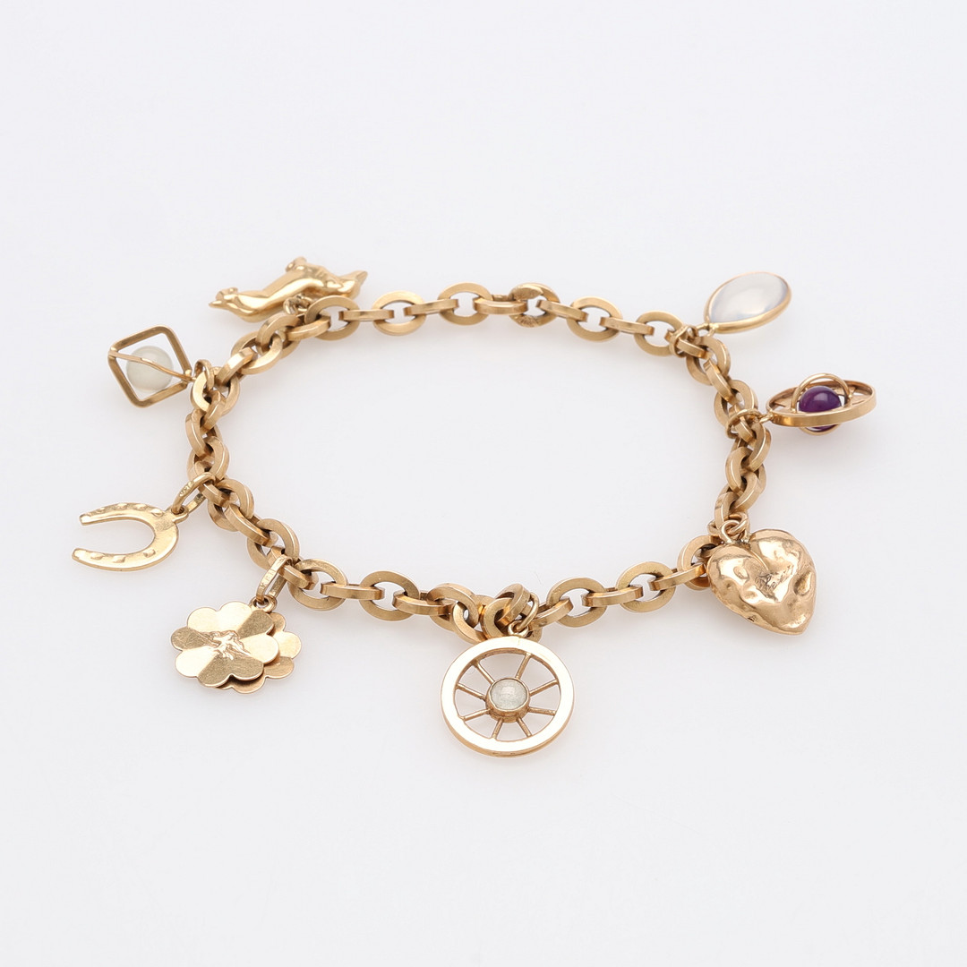 BERLOCKARMBAND, 18K GULD, TOTAL VIKT 12,4 GRAM.
