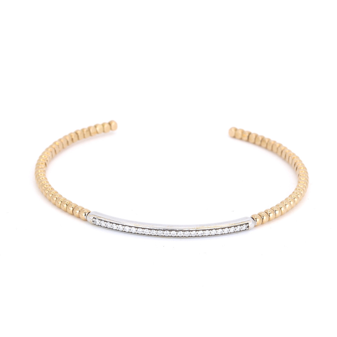 18CT GOLD DIAMOND BANGLE.