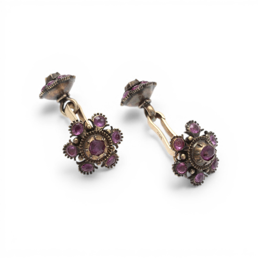 Historicist style gold and rubies cufflinks.