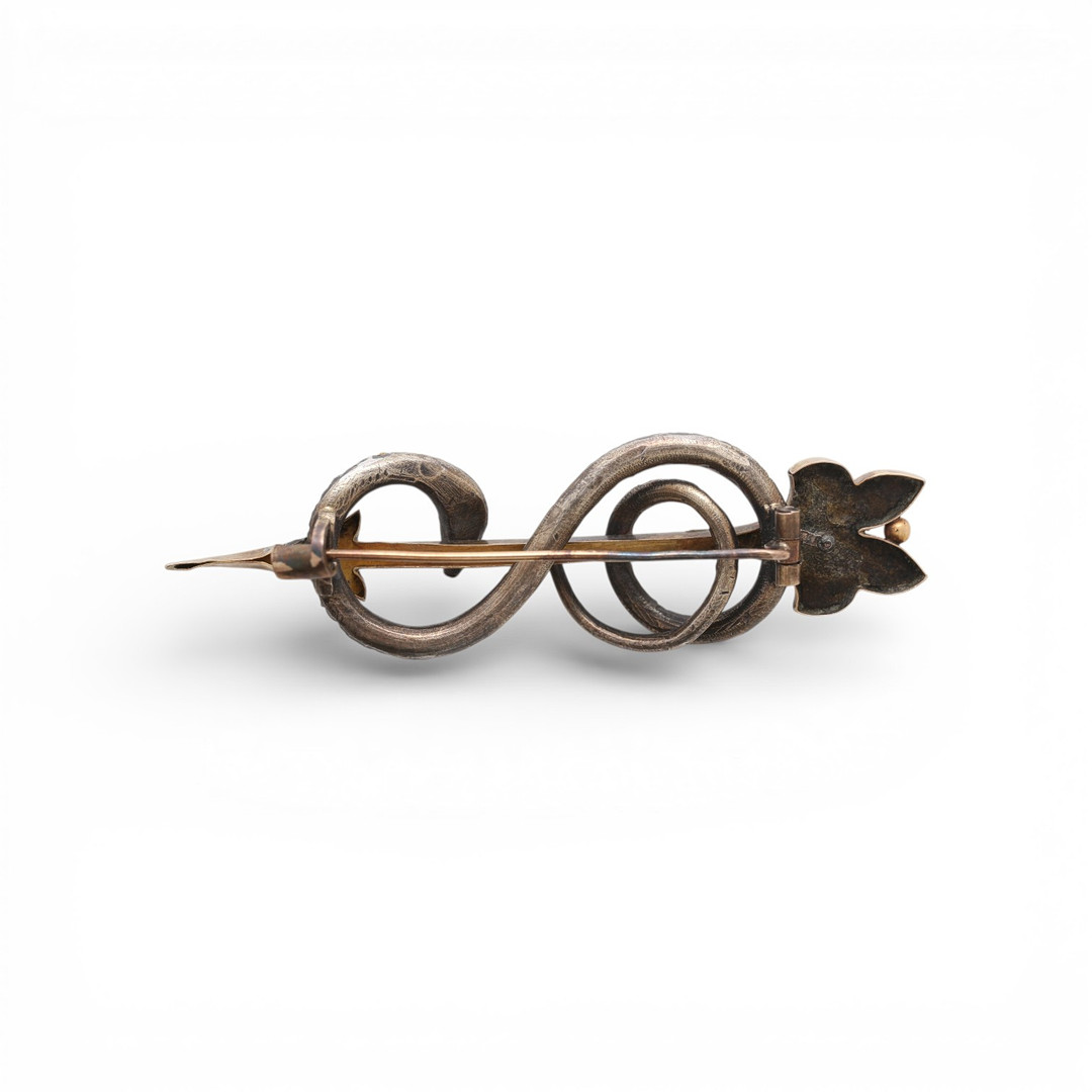 Arrow-shaped brooch with a snake, late 19th Century.