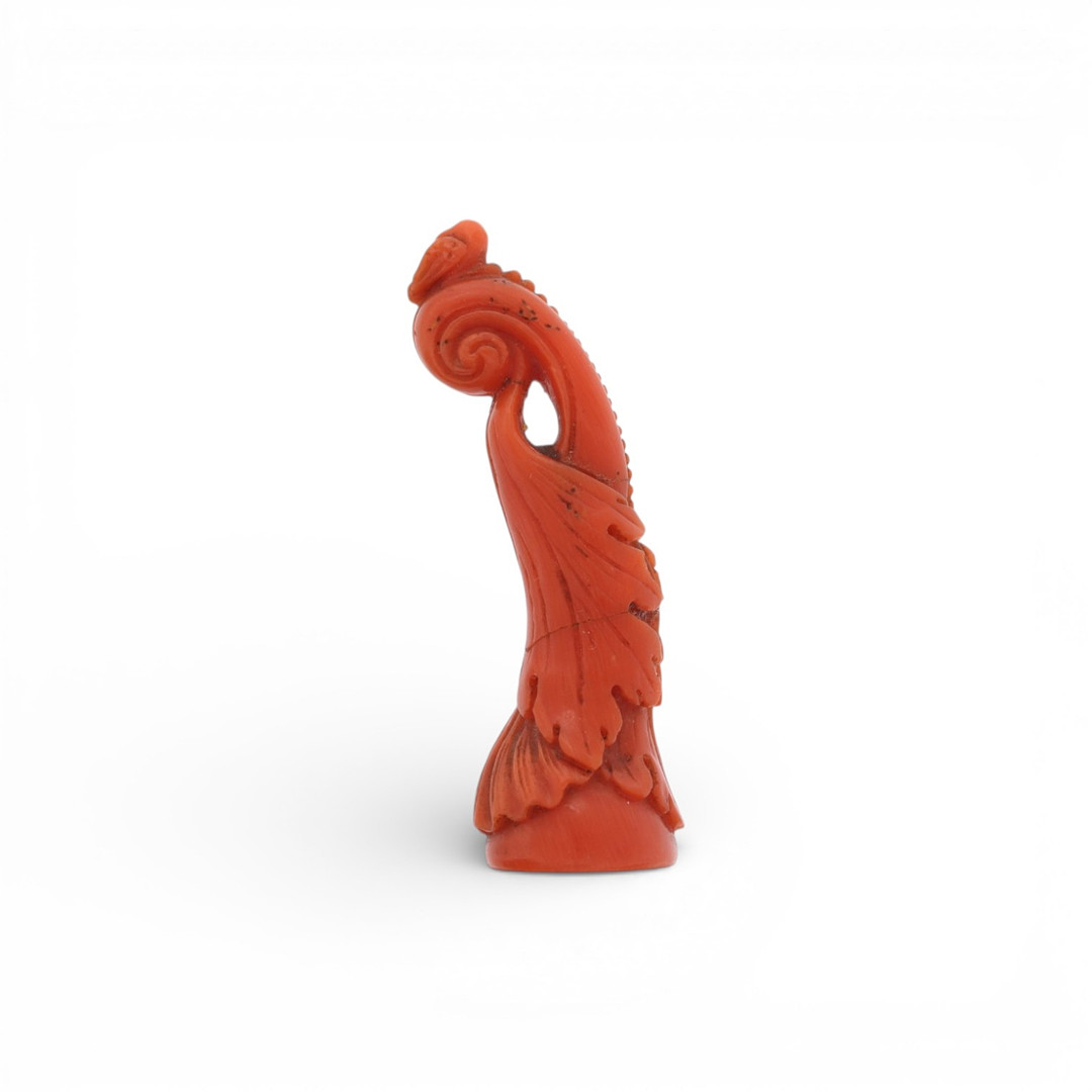 "Scroll with a bird and foliage", small Italian "corallium" coral sculpture, probably carved for a seal, late 19th Century.