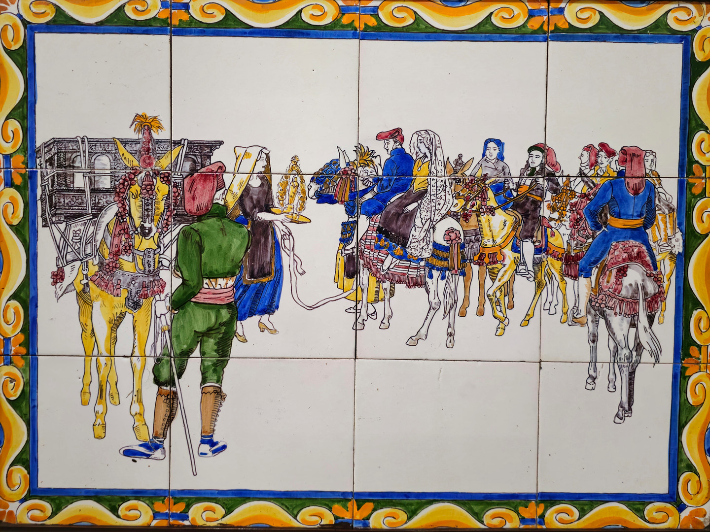 Azulejos enmarcados representando una boda.