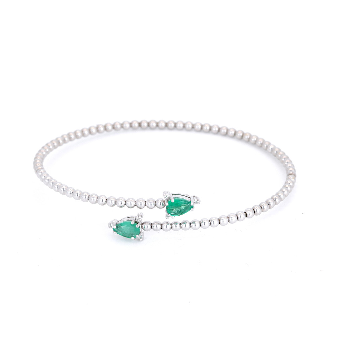 18CT EMERALD & DIAMOND BANGLE.