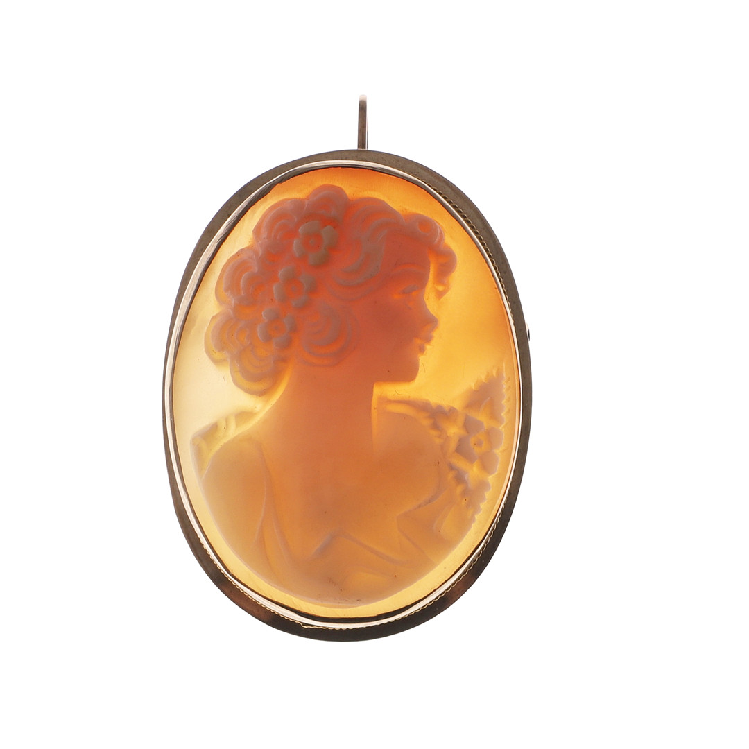 A SHELL CAMEO BROOCH/PENDANT IN 9CT GOLD MOUNT.