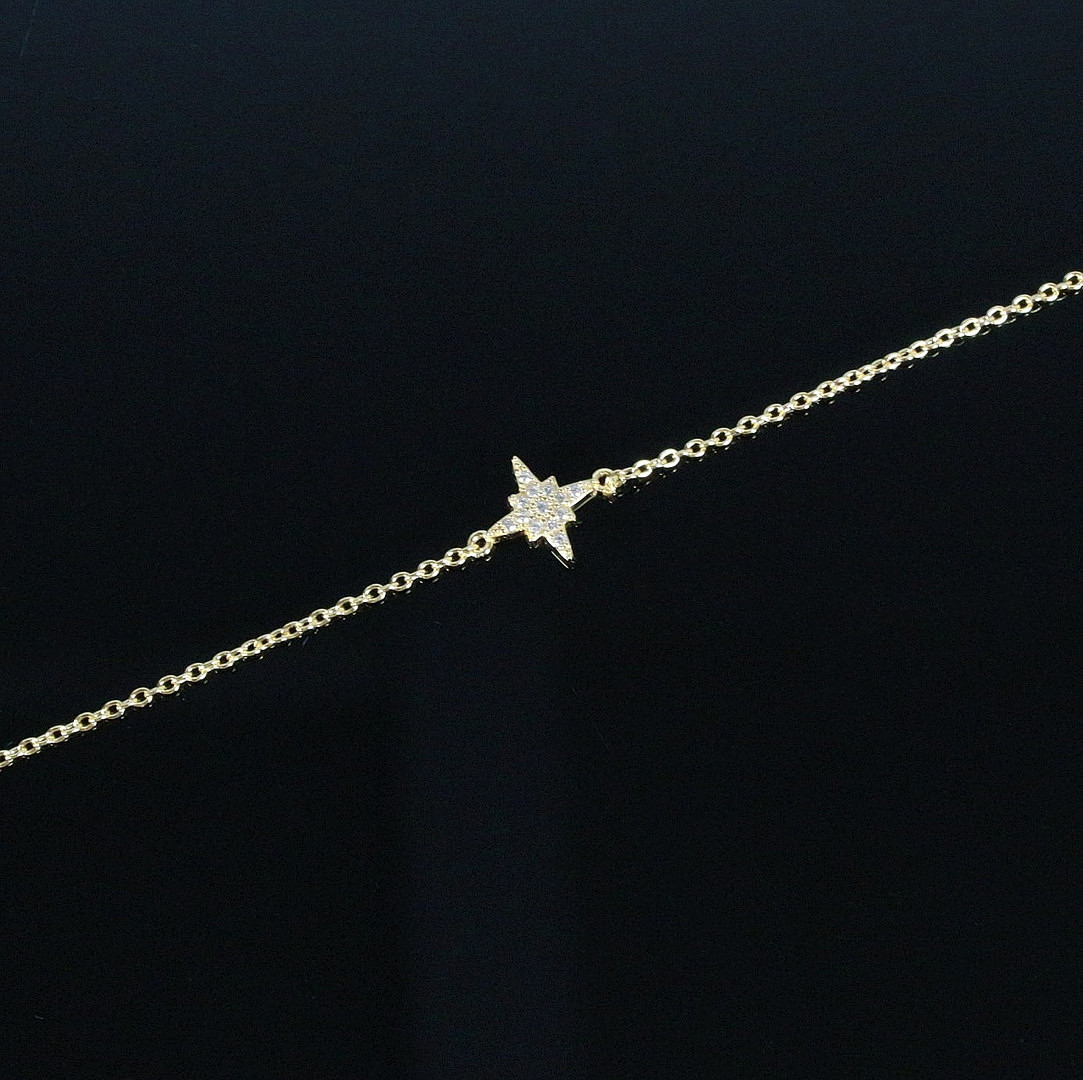 MERALIN JEWELRY. Armband mit Stern, besetzt mit Zirkonia, 925er Sterlingsilber, vergoldet, Italien.