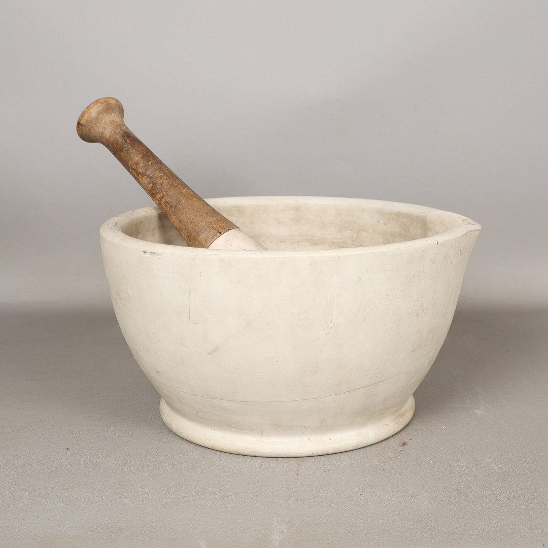 A LARGE MARBLE MORTAR AND PESTLE (2).