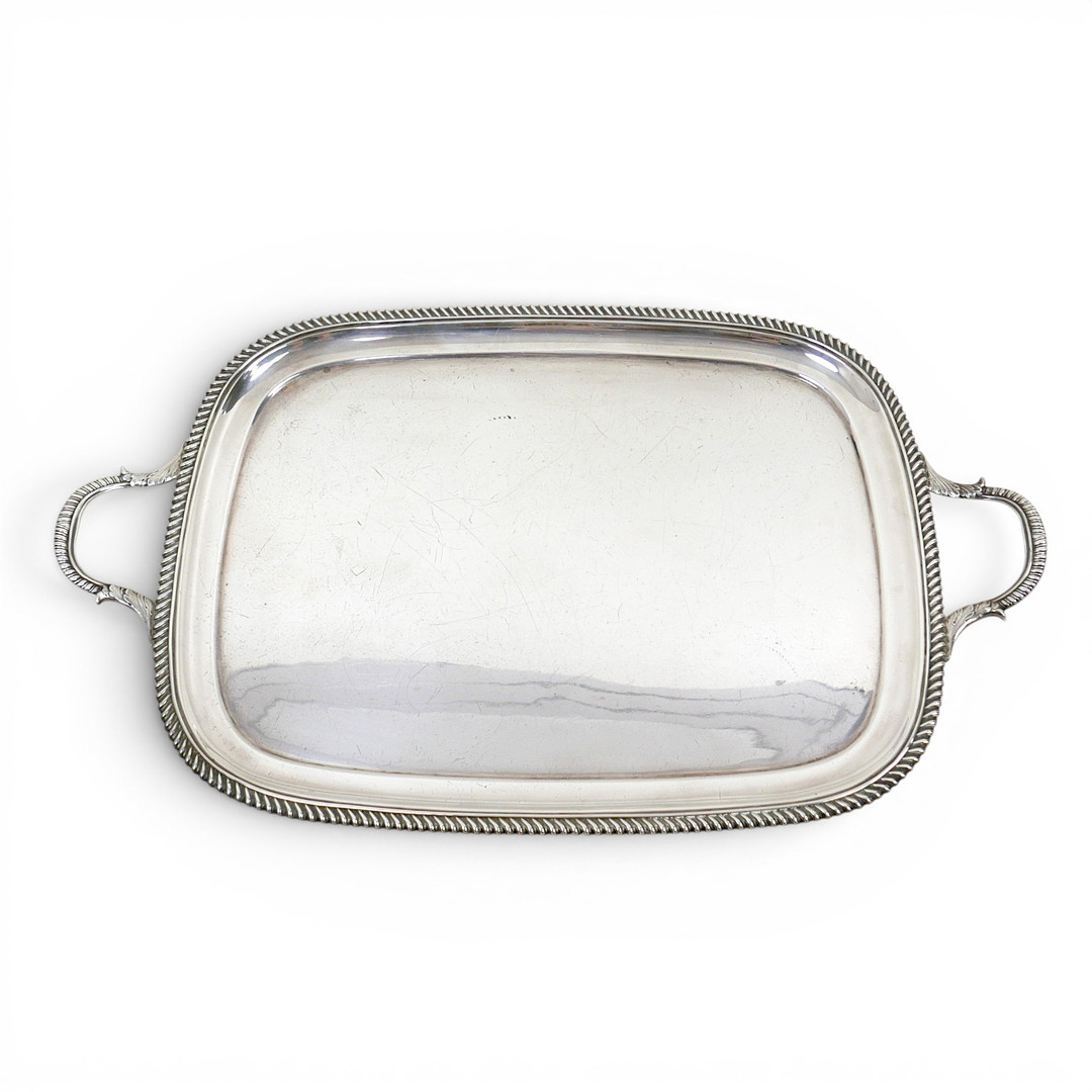 A GEORGE V SILVER TWIN HANDLE TRAY.