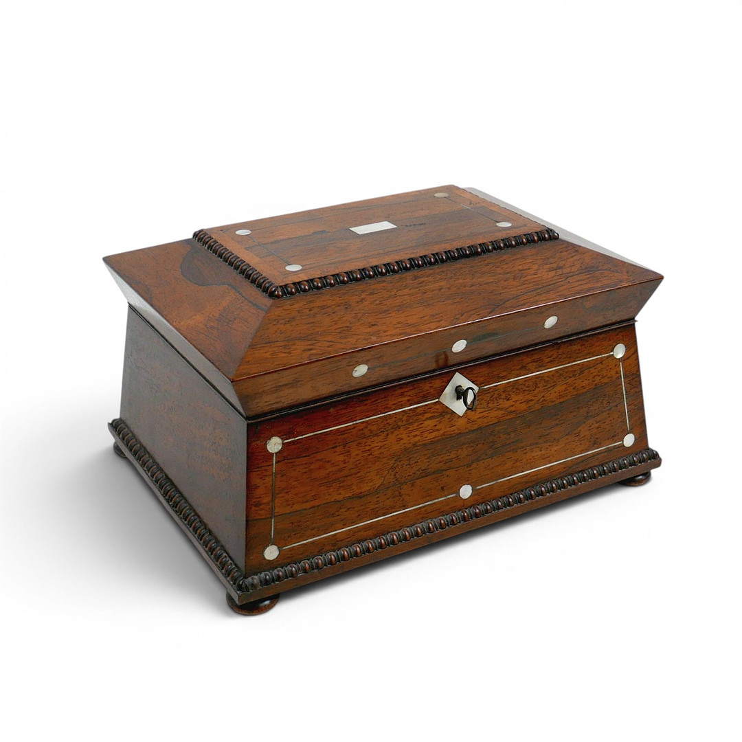 A 19TH CENTURY ROSEWOOD AND MOTHER OF PEARL SEWING BOX.