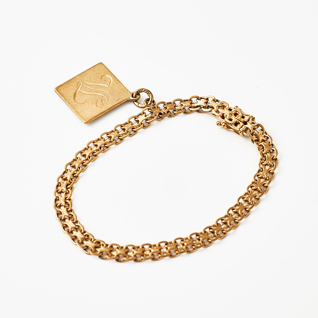 ARMBAND, 18 k guld, x-länk, med berlock, Ädelsmycken, Stockholm 1958.