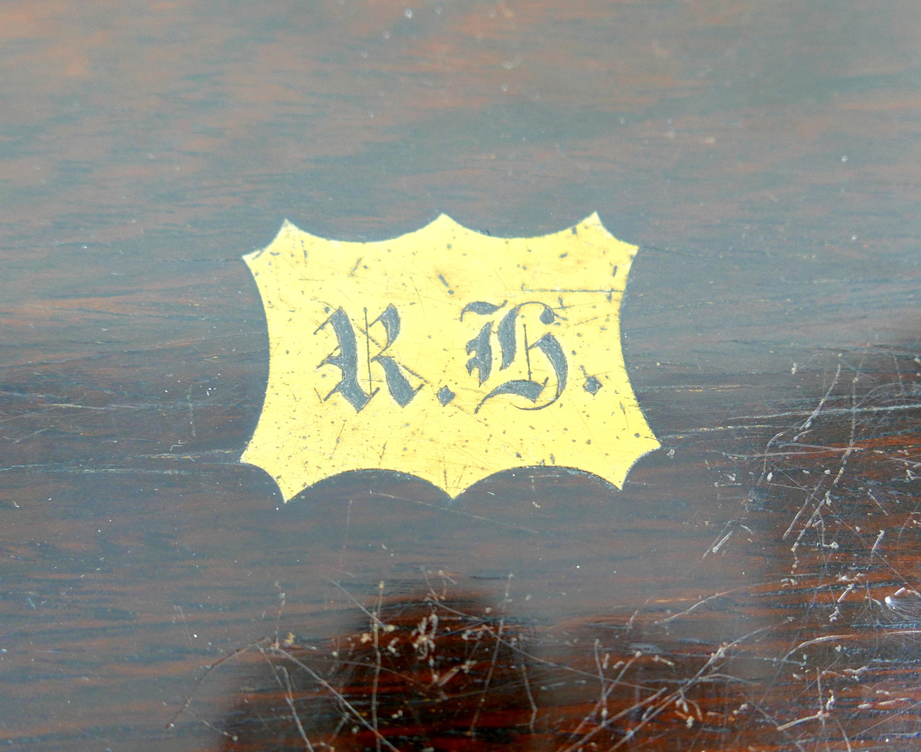 A 19TH CENTURY ROSEWOOD WRITING SLOPE WITH BRASS CORNERS.