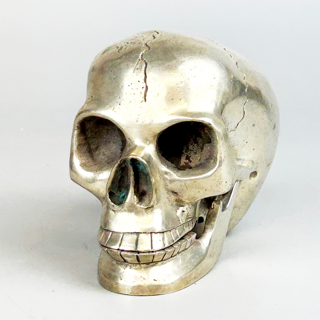 SILVER PLATED SKULL.