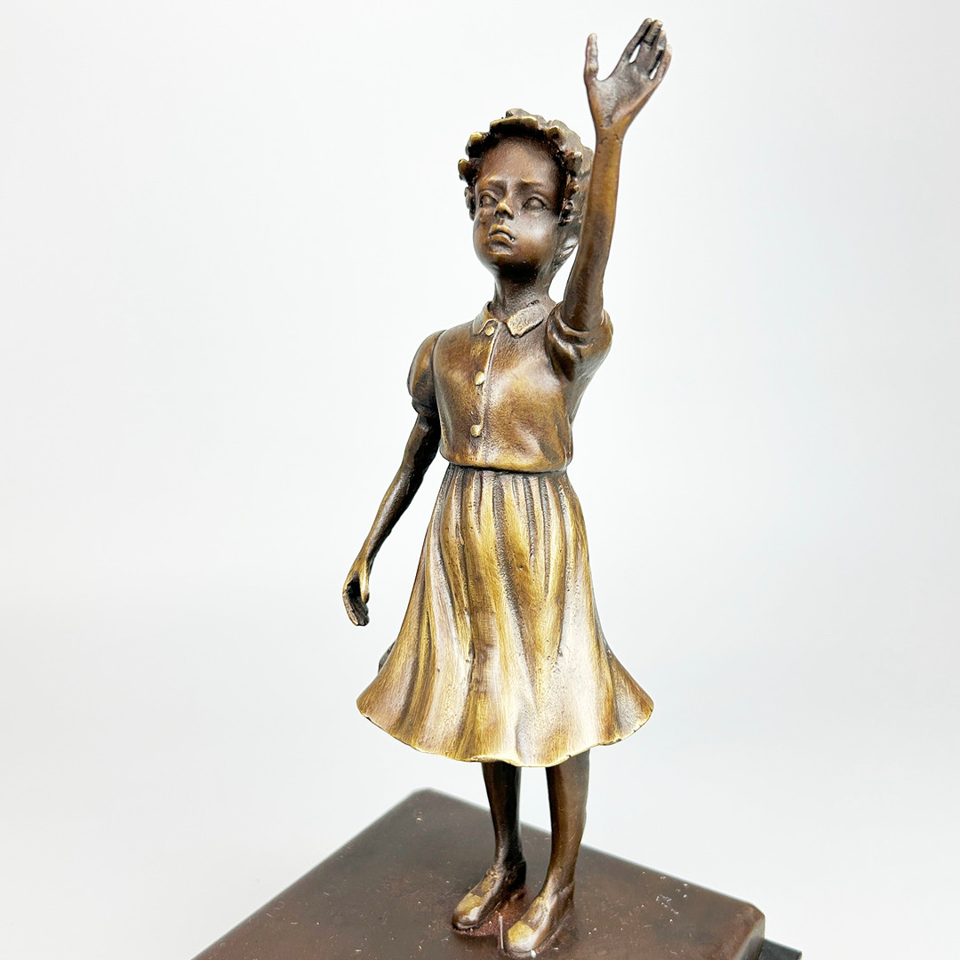 BRONZE BANKSY STYLE FIGURE.