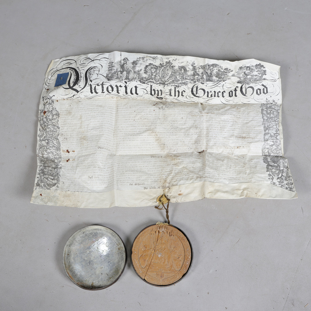 A 19TH CENTURY MANUSCRIPT INDENTURE WITH A YELLOW WAX ROYAL DOCUMENT GREAT SEAL.