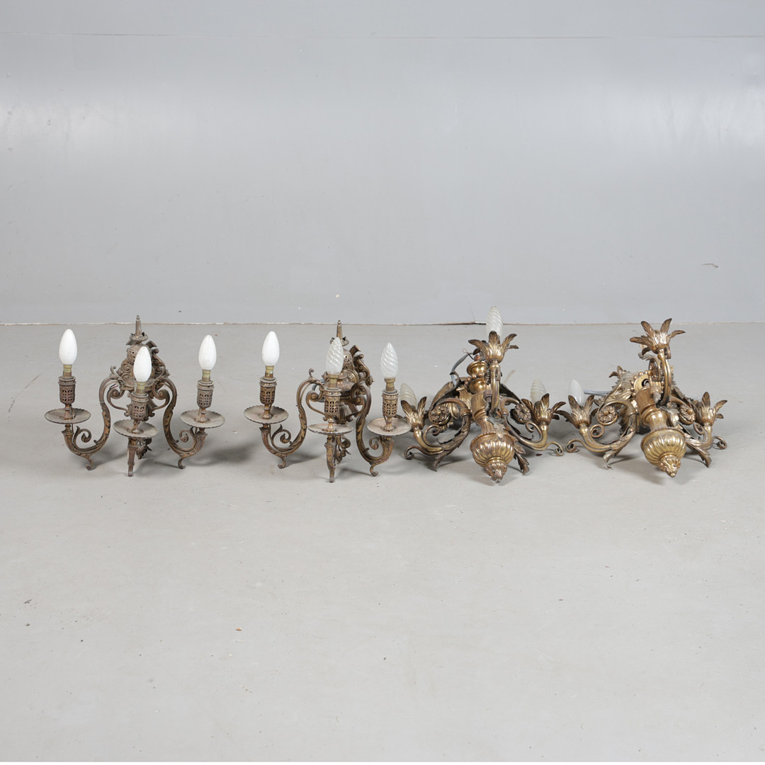 A PAIR OF BRASS THREE BRANCH CHANDELIERS AND A PAIR OF WALL LIGHTS (4).