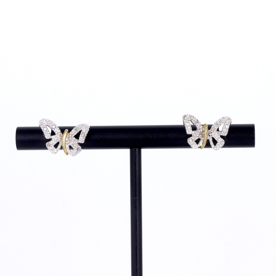 9CT GOLD DIAMOND STUDS.