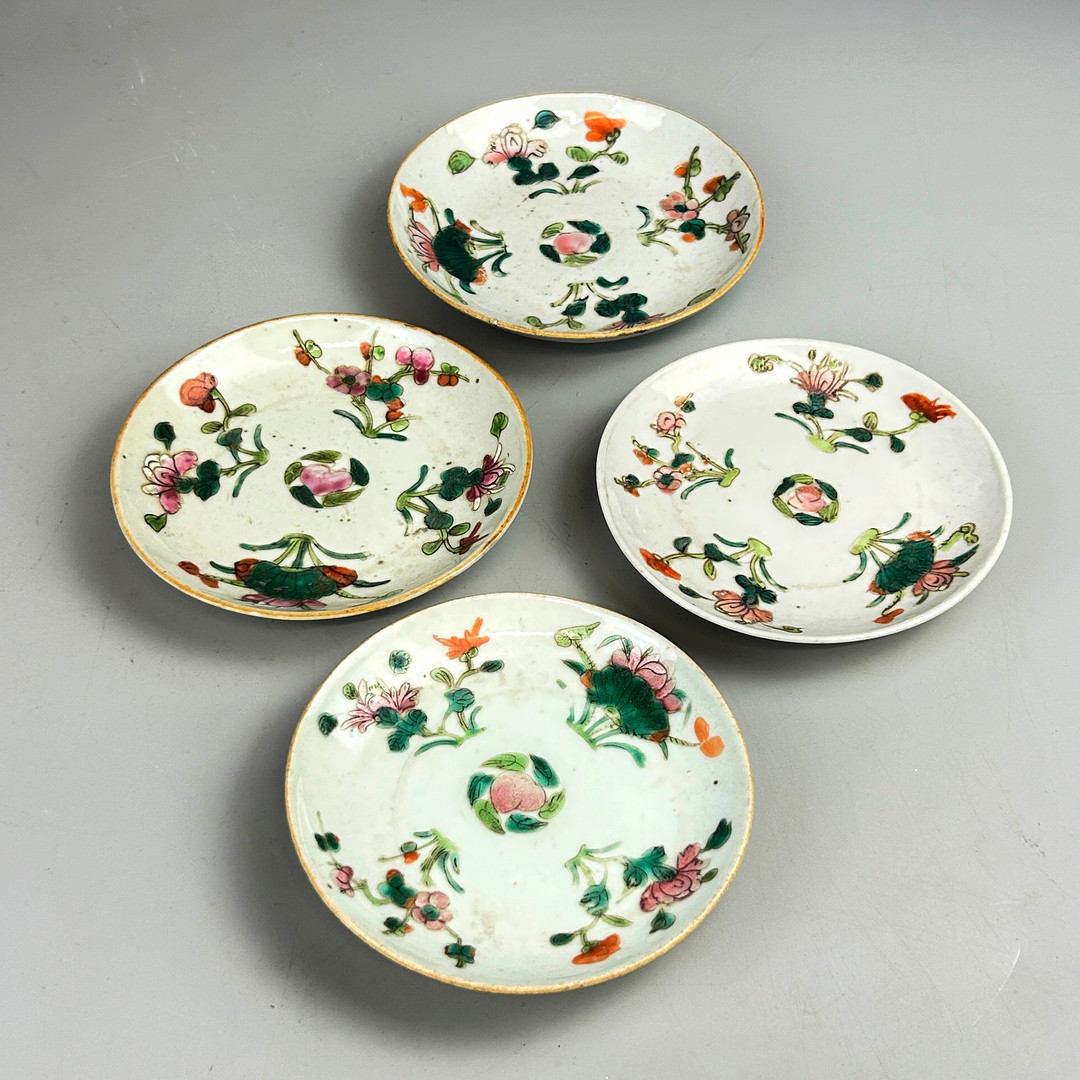 FOUR ORIENTAL PLATES.