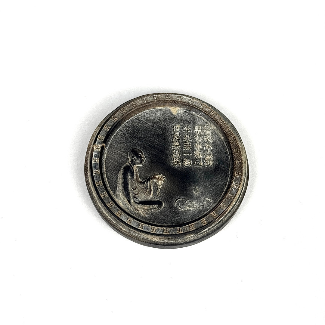 CARVED HORN AMULET.