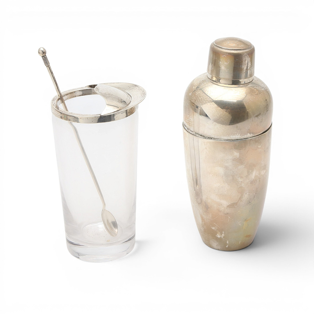 Cocktail shaker and mixing jug with spoon in silver, circa 1970.