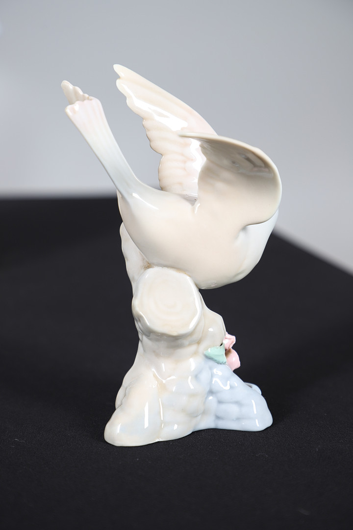 A BESWICK POTTERY MODEL OF A COCK PHEASANT.