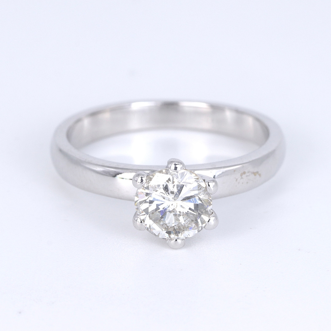 18CT 0.97 CT DIAMOND SOLITAIRE RING.