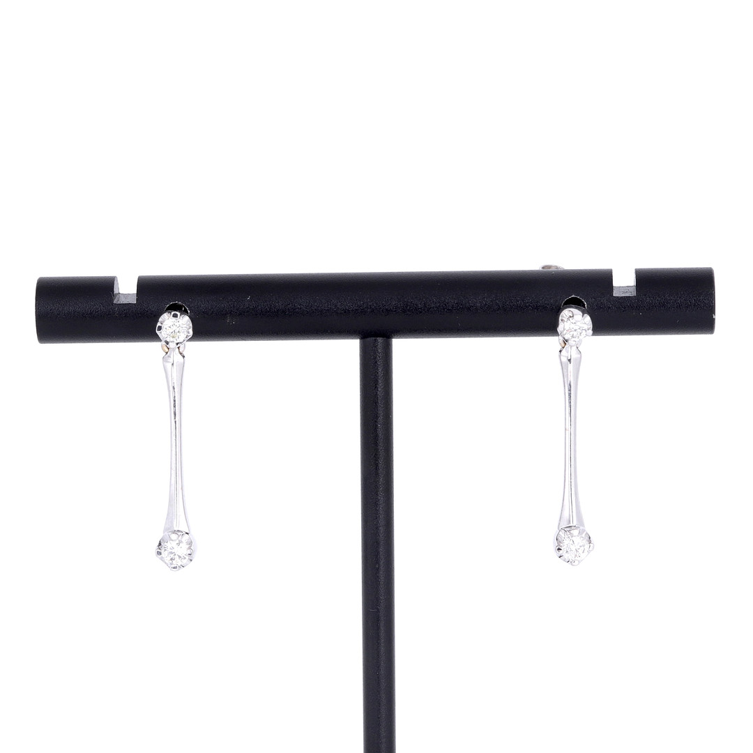 18CT GOLD DIAMOND EARRINGS.