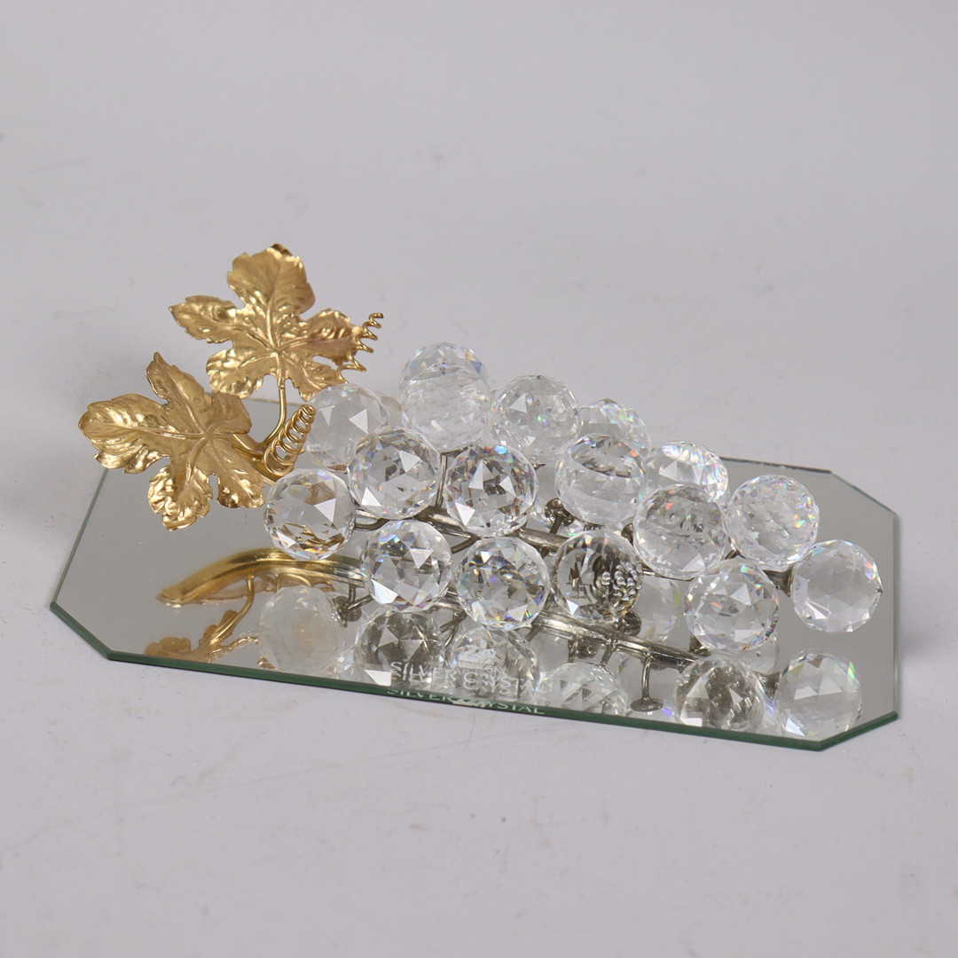 SWAROVSKI, druvklase i kristall och mässing på spegelplatta.