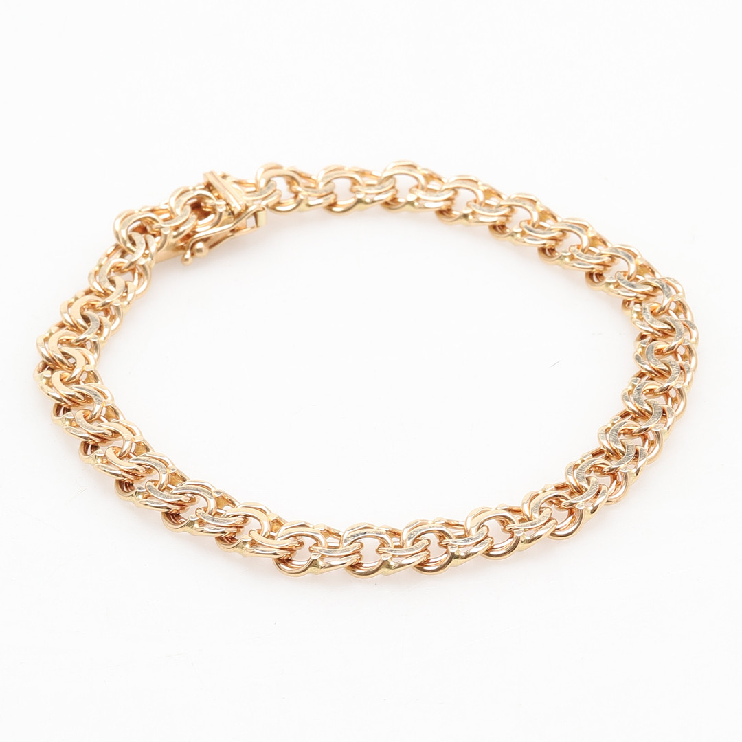 ARMBAND. 18K guld. Bismarck. Stämplad IPO, IPO Handels AB Sundsvall. Vikt ca 24 gram.