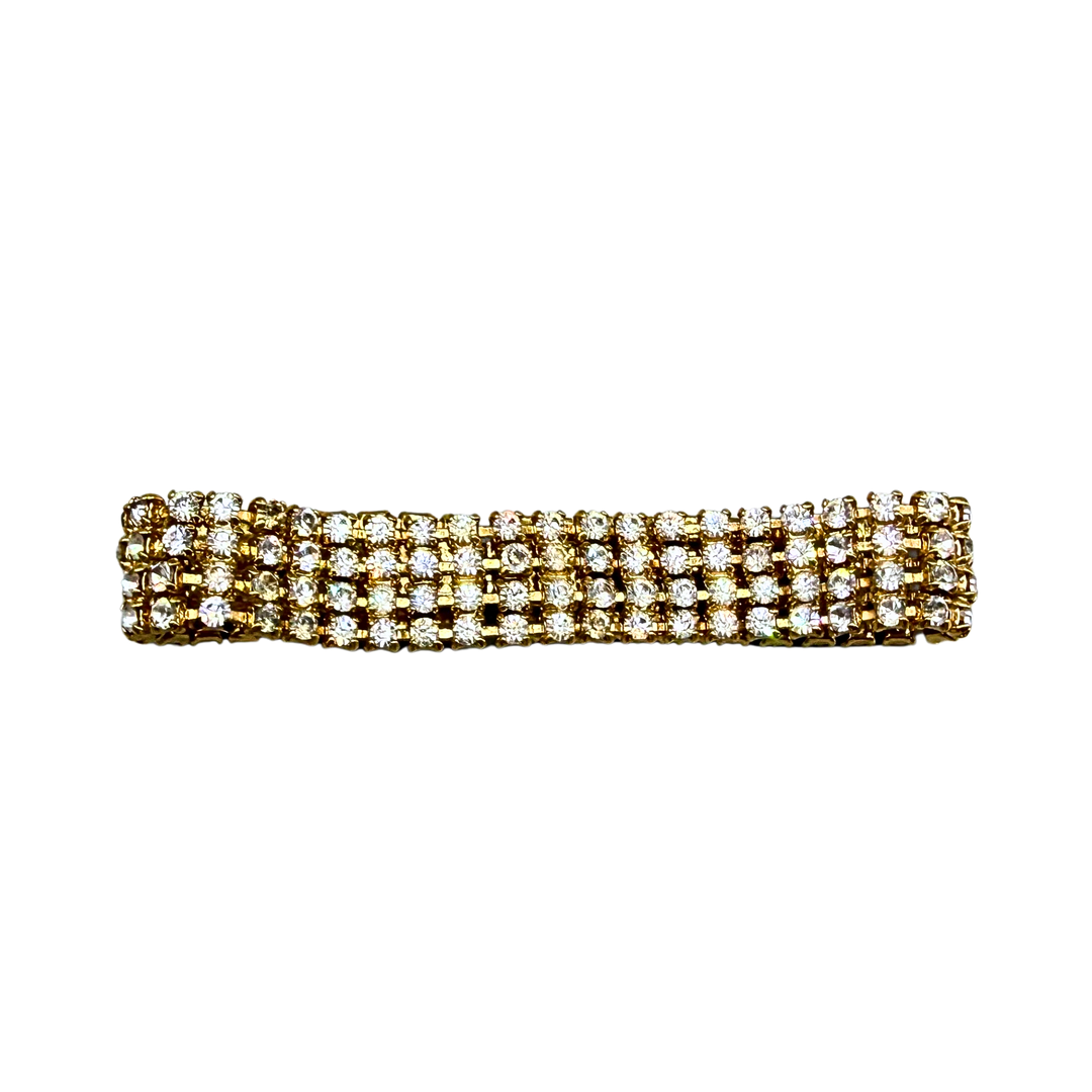 VIERREIHIGES TENNISARMBAND AUS METALL, BESETZT MIT STRASSSTEINEN.