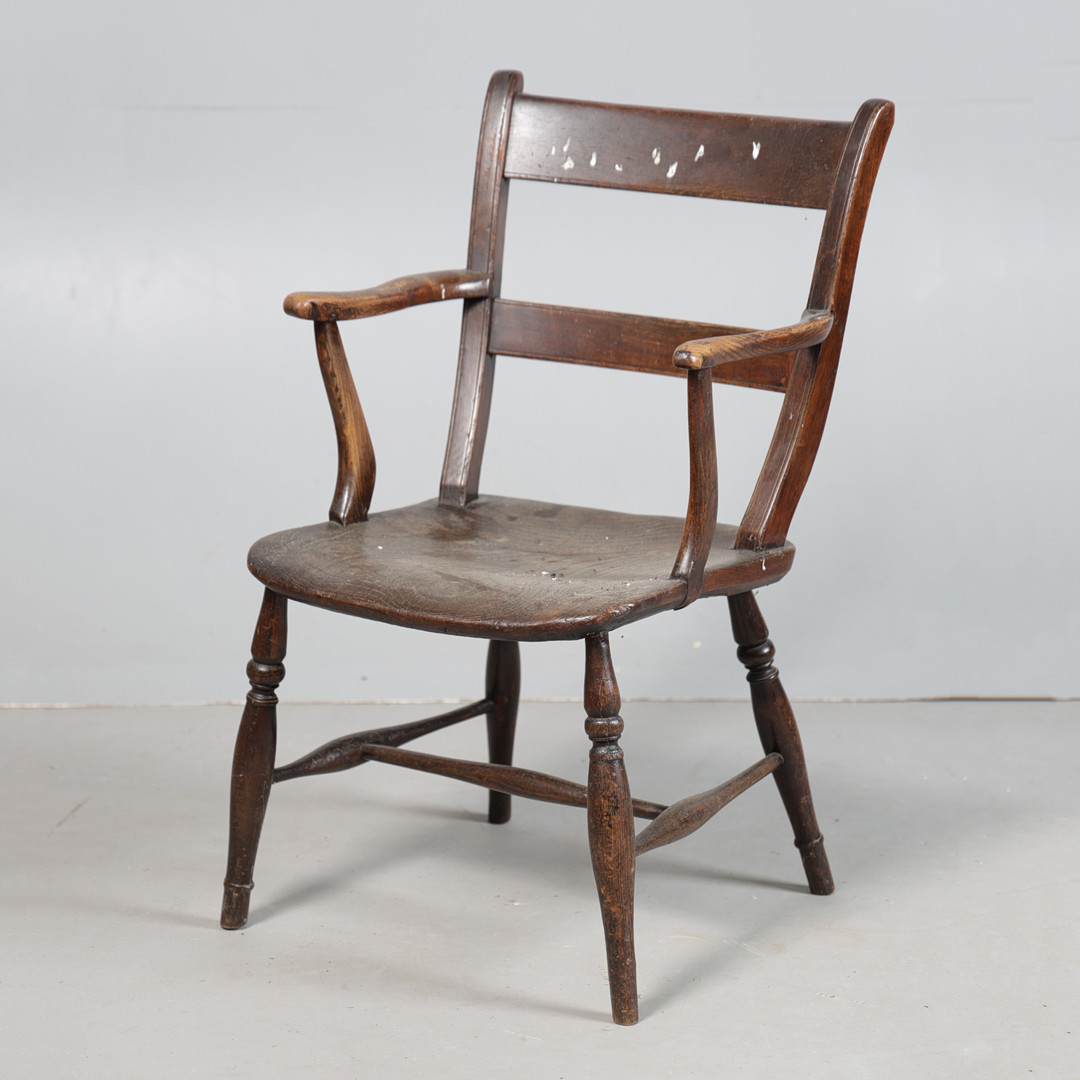 A GEORGE III ELM SEATED ELBOW CHAIR.