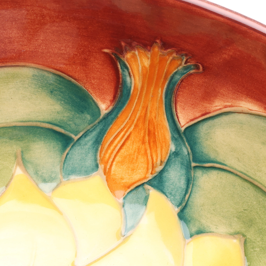 MOORCROFT INCA SUNFLOWER PATTERN BOWL AND PLATE. (2).