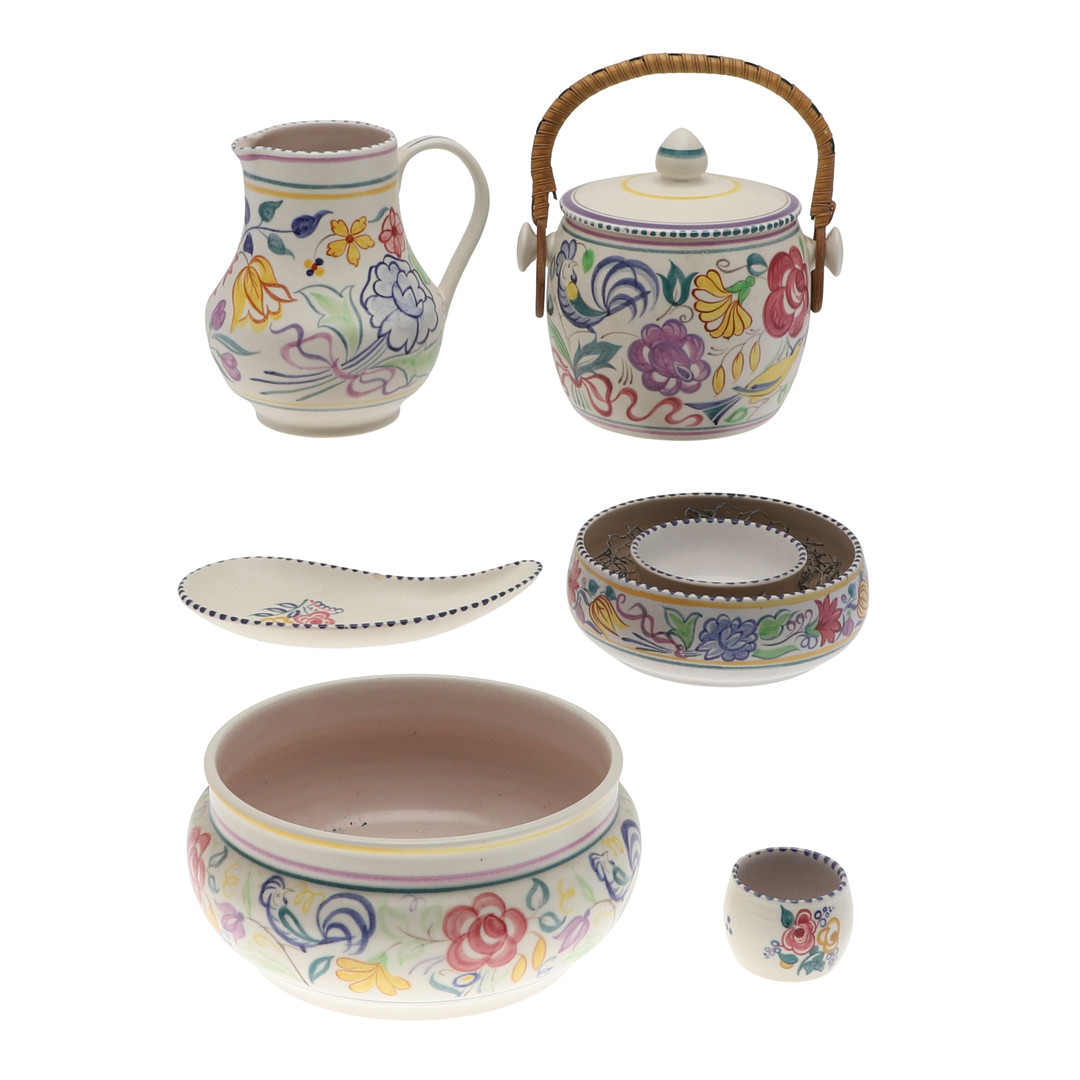 A COLLECTION OF POOLE POTTERY FLORAL DECORATED WARES.