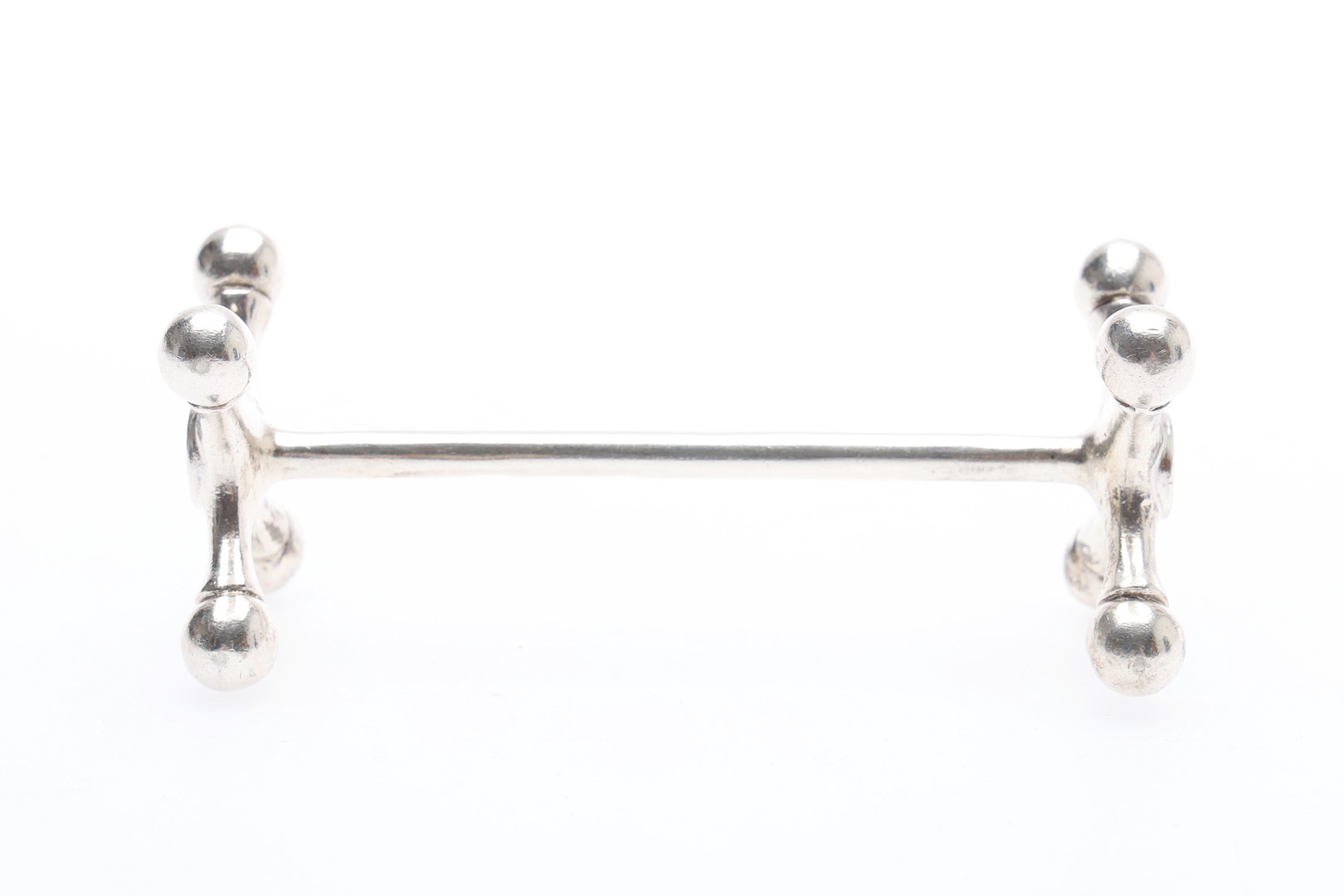 PAIR OF GEORGE V SILVER KNIFE RESTS.