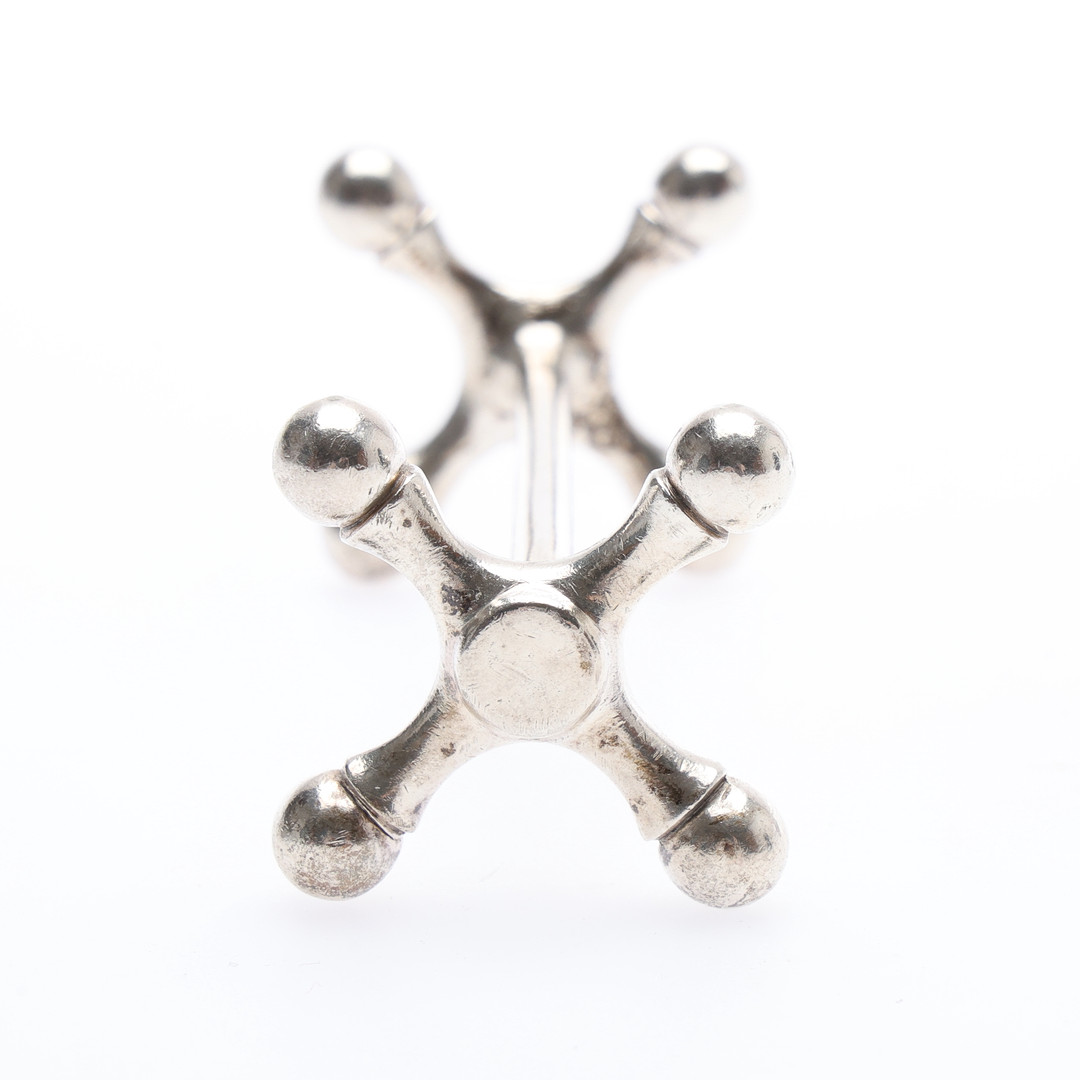 PAIR OF GEORGE V SILVER KNIFE RESTS.