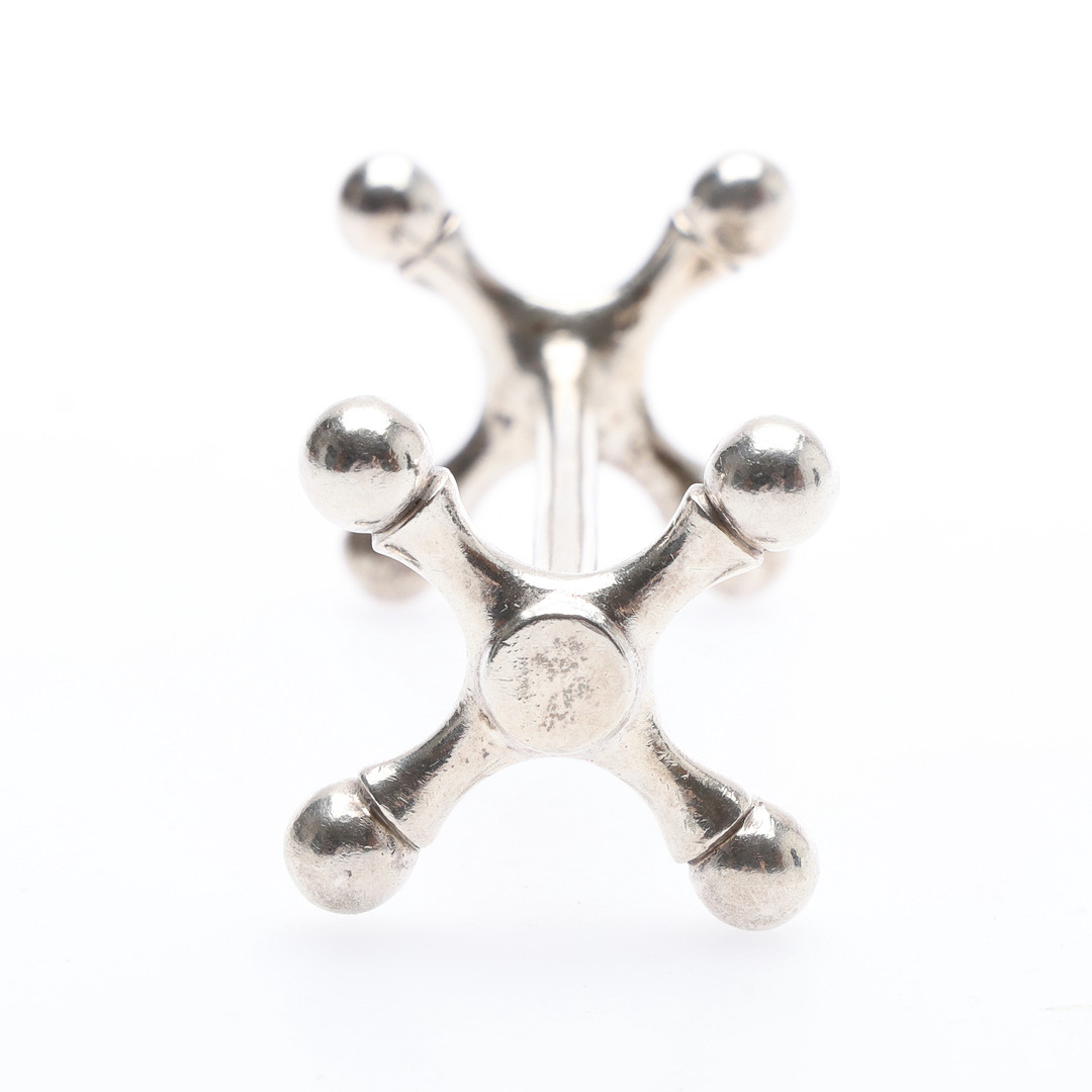PAIR OF GEORGE V SILVER KNIFE RESTS.