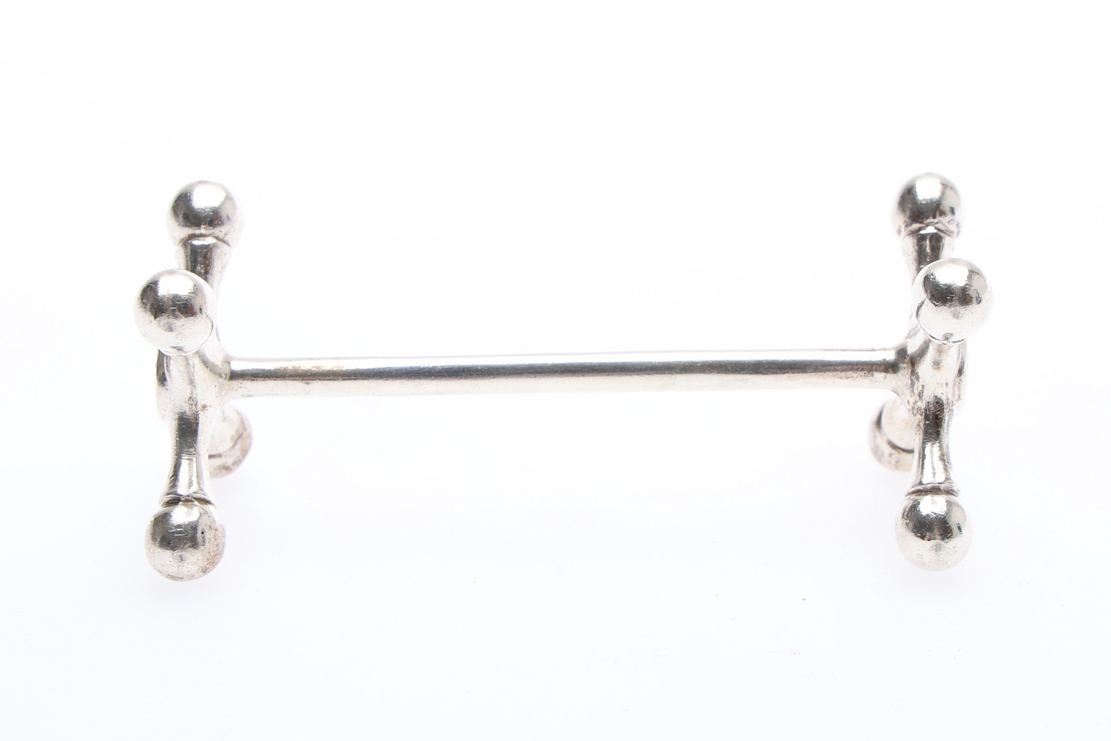PAIR OF GEORGE V SILVER KNIFE RESTS.